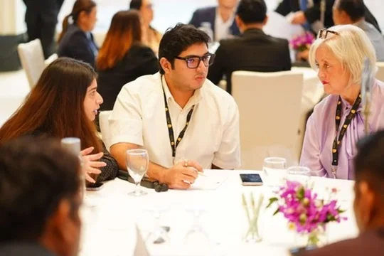 Syed Husnain Haider Bukhari in conversation with guests at the ACES Summit 2026